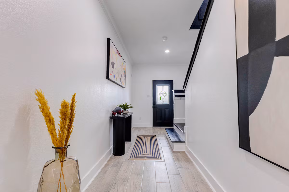 Entry hallway leading into the residence